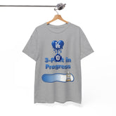 Gray t-shirt with blue graphics and text on a hanger against a white background