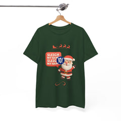 Green t-shirt with Santa Claus graphic and 'Sleigh My Name' text on a hanger against a white background